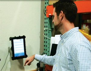 A field associate tries out the new tablet system.